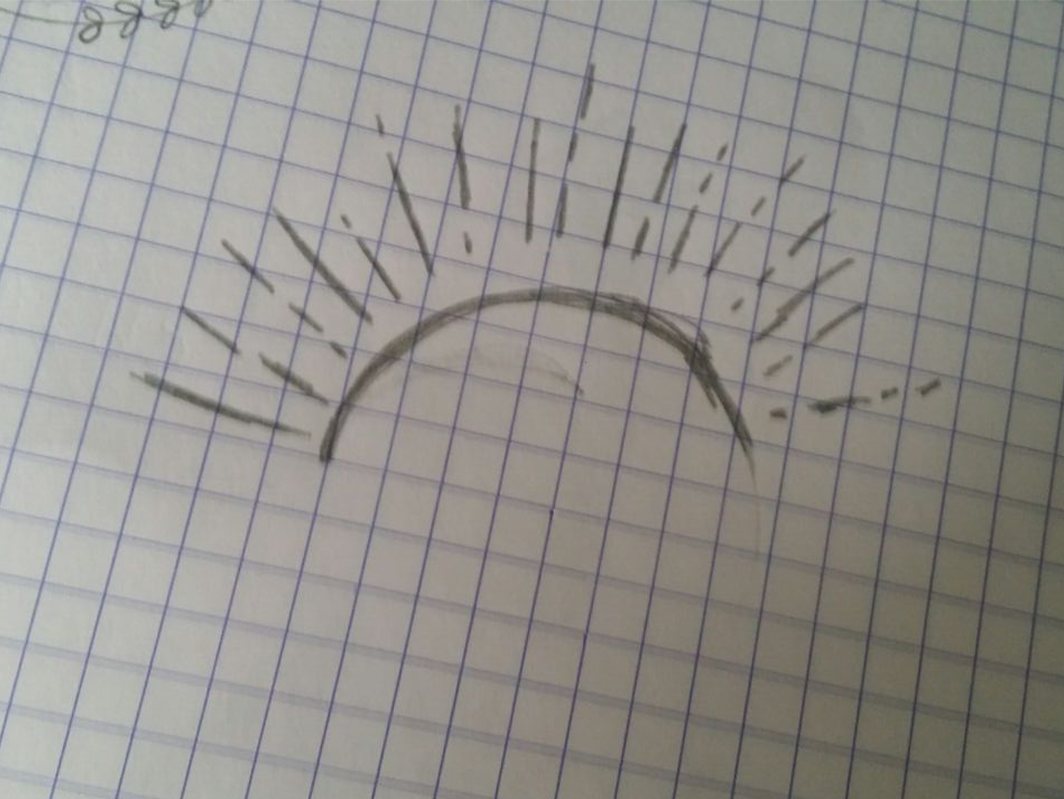Pencil sketch on squared paper of a half sun with rays.