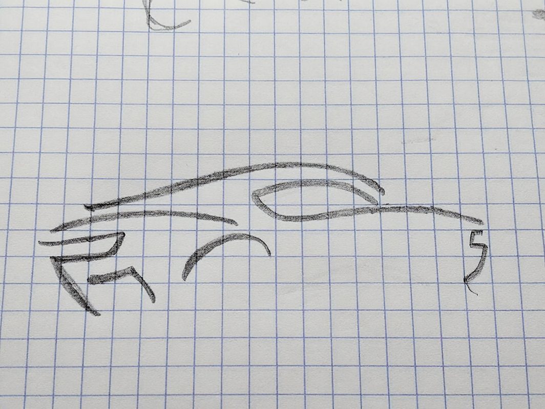 Pencil sketch on squared paper of the outline of a sports car.