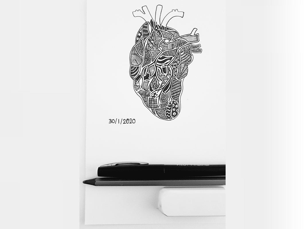 Black ink drawing of an anatomical heart filled with detailed patterns, dated 30/1/2020, with a pen and a pencil below it.